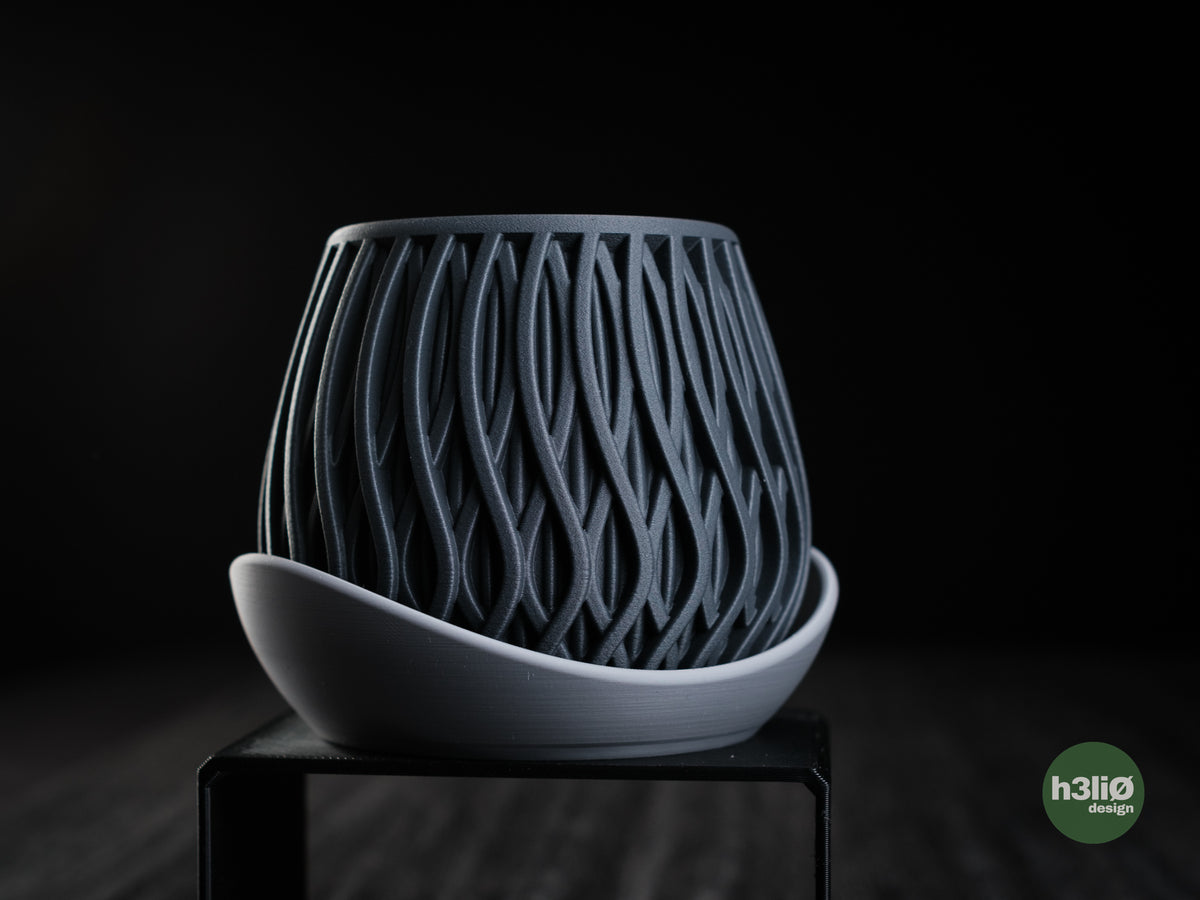 Alvao — сферичен planter с вълнообразен вертикален релеф
